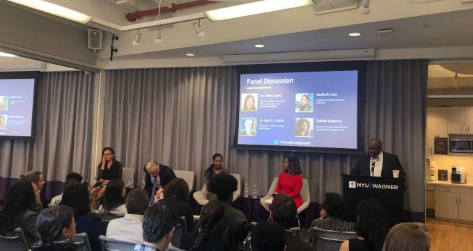 image of the panel with participants talking